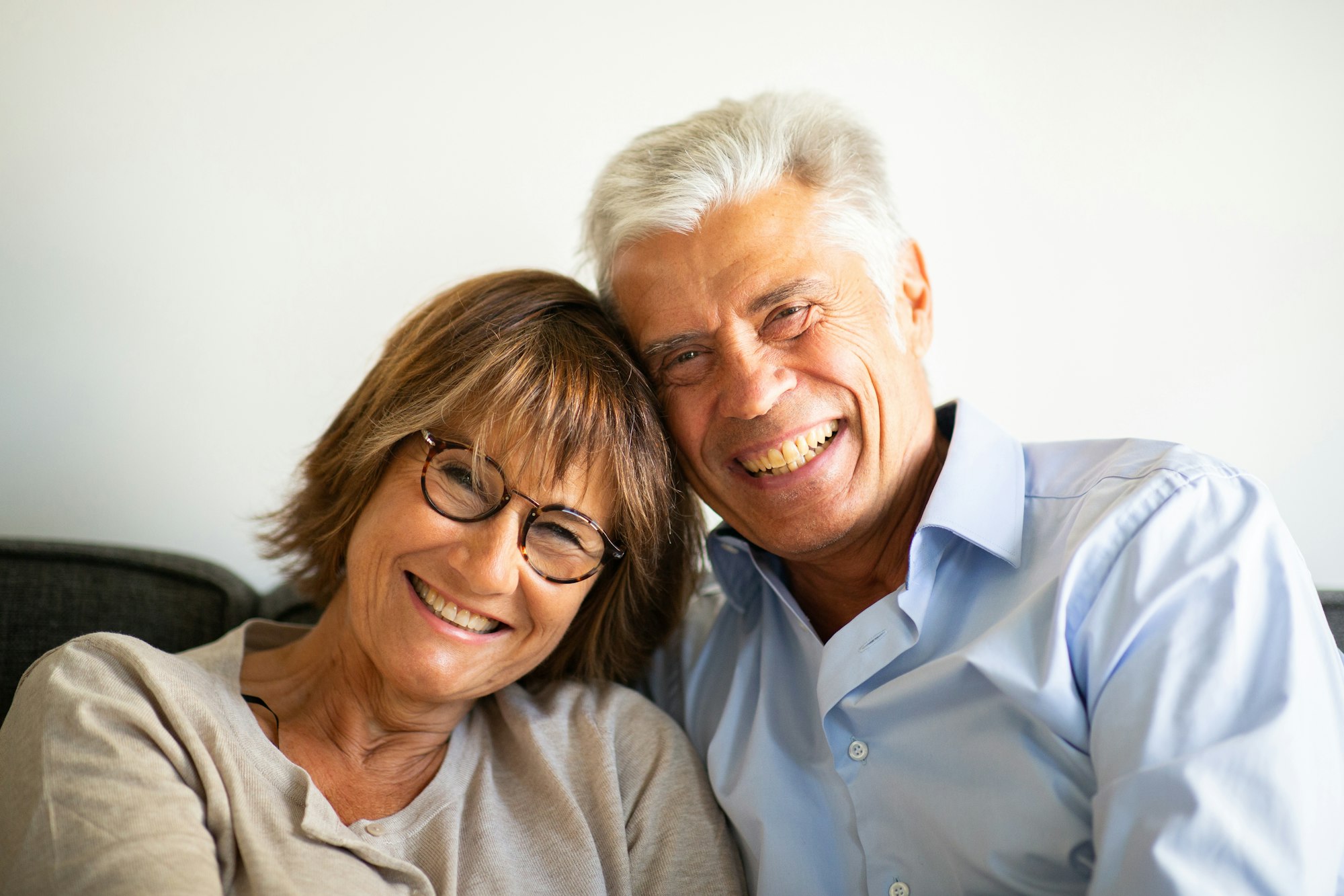 Close up older couple smiling together